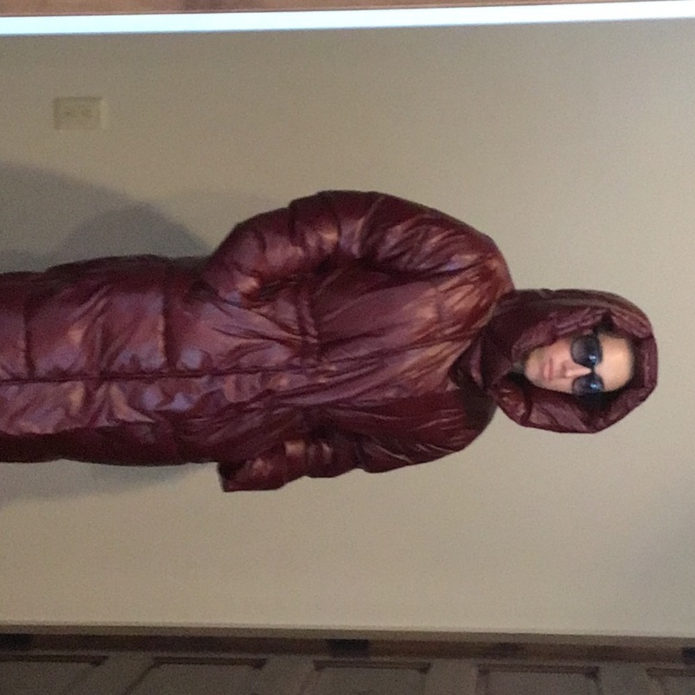 Women’s small red winter parka by a new day.